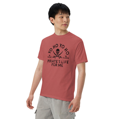 Person wearing a red t-shirt with black text and graphics on a white background